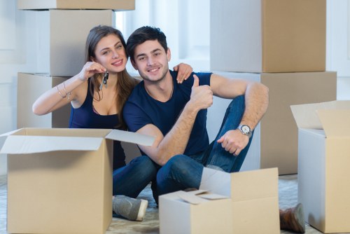 Removal team preparing a move in a Nine Elms apartment building