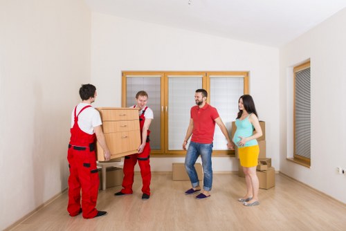 Removal team preparing a local move in Nine Elms with boxes and furniture