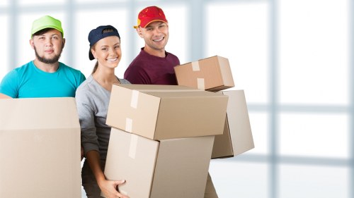 Trained movers handling items carefully during a Nineelms relocation